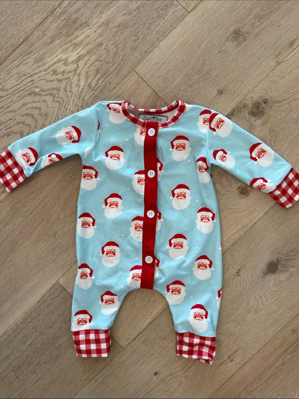 Santa Print Blue Baby One Piece Pajamas with Red Gingham Trim